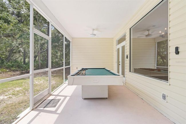 11933 Pasco Trails Blvd, House other with 4 bedrooms, 3 bathrooms and null parking in SPRING HILL FL | Image 28