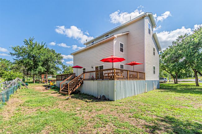 Back of property featuring a deck | Image 37