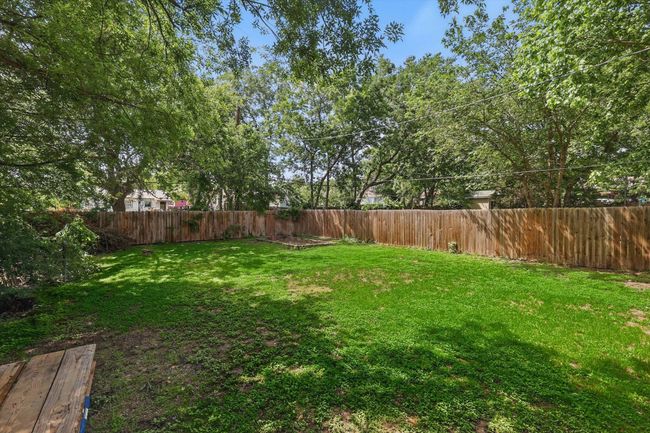 View of yard featuring a fenced backyard | Image 15