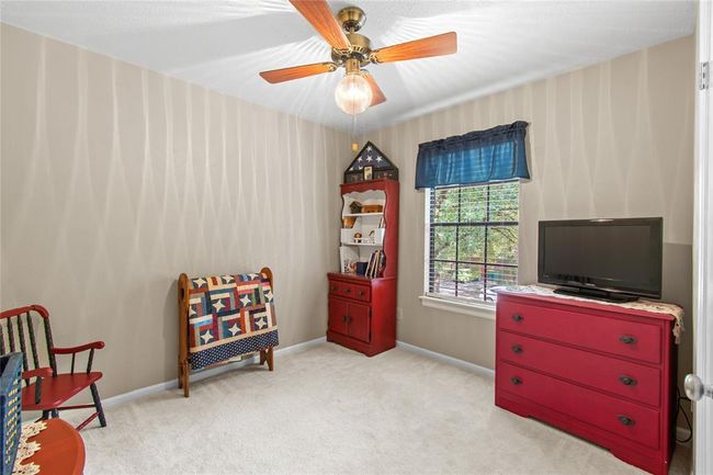 Upstairs has 2 bedrooms that face the front of the house. | Image 23
