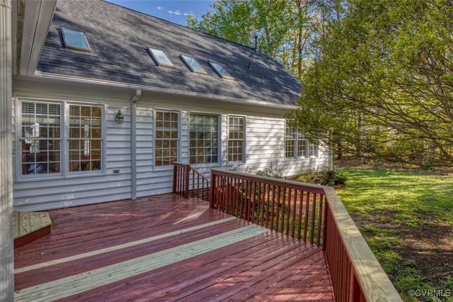 Deck featuring a lawn | Image 18