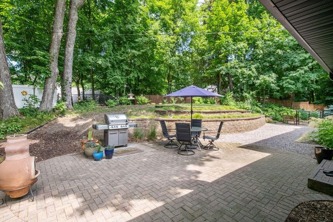 Lower level patio makes the perfect spot for grilling and dining al fresco | Image 32