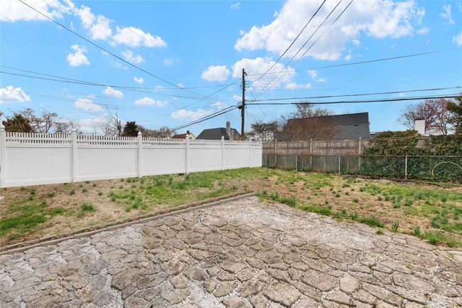 View of yard featuring a fenced backyard | Image 23