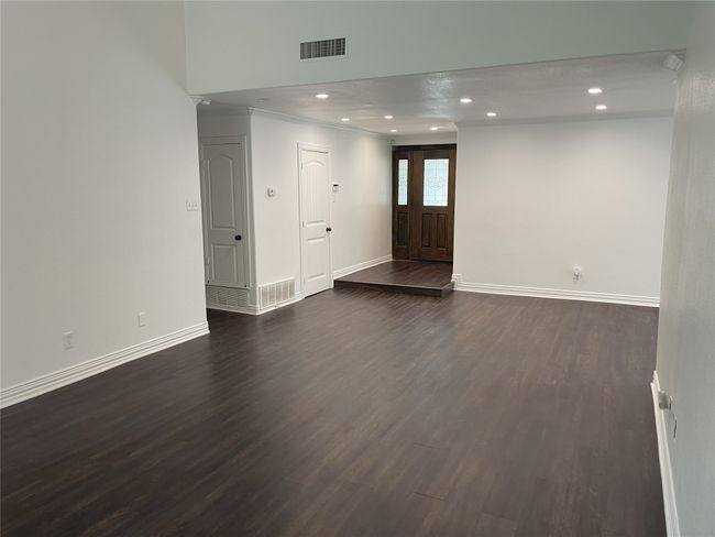 Foyer with dark wood-type flooring, recessed lighting, and ornamental molding | Image 11