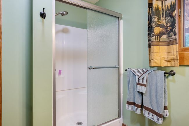 Bathroom featuring a stall shower | Image 47