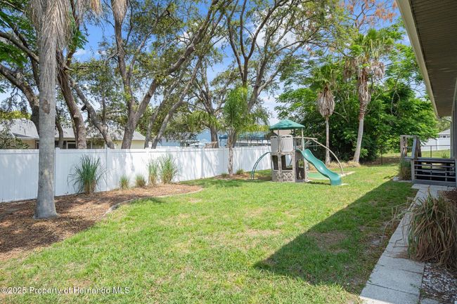11242 Riddle Dr, House other with 3 bedrooms, 3 bathrooms and null parking in SPRING HILL FL | Image 53