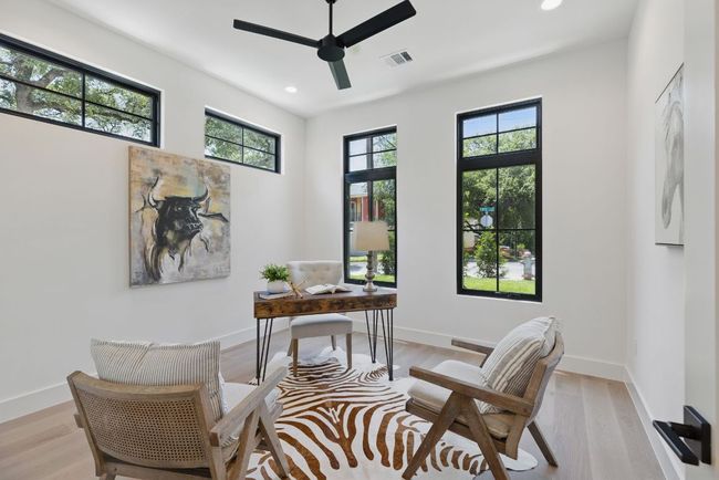 Office area featuring a ceiling fan, recessed lighting, light wood-style flooring, and baseboards | Image 13
