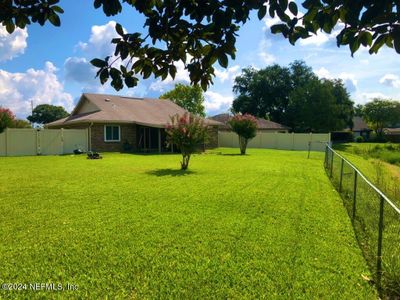 7038 Cane Grass Lane E, House other with 3 bedrooms, 2 bathrooms and null parking in Jacksonville FL | Image 3