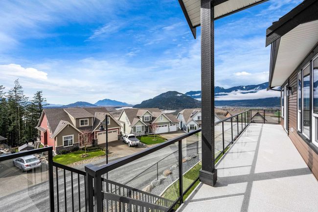 Balcony featuring a residential view and a mountain view | Image 5