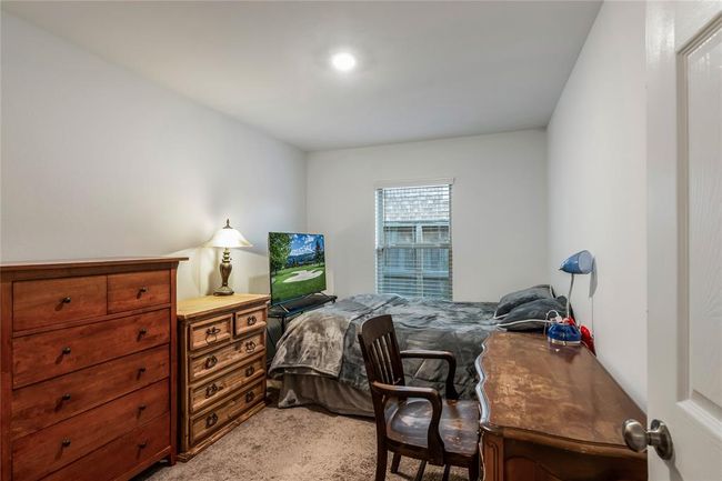Third bedroom, ideal for a nursery, teen room, or cozy guest retreat. | Image 19