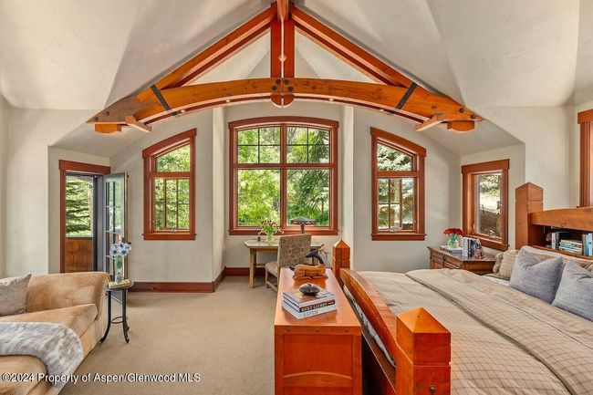 Primary bedroom has some of the most beautiful windows in the house. | Image 28