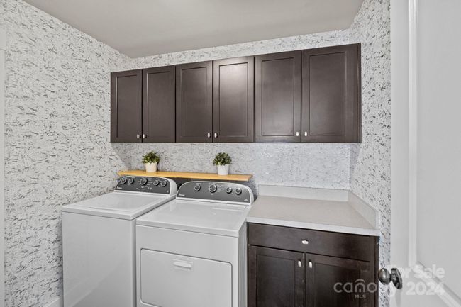 Upper level Laundry Room with storage | Image 23