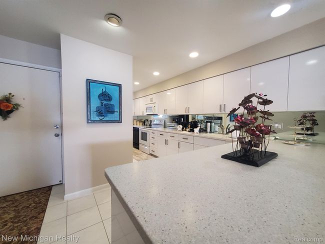 Modern Kitchen with Corian tops & 2 sinks | Image 14