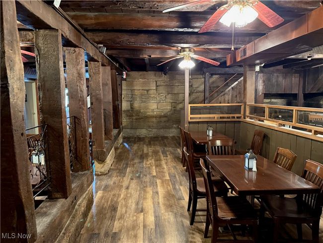 Dining room with ceiling fan and hardwood / wood-style flooring | Image 29
