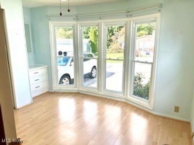 Entryway with light wood-type flooring | Image 3