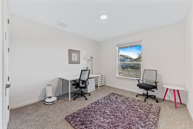 Carpeted office with visible vents and baseboards | Image 23