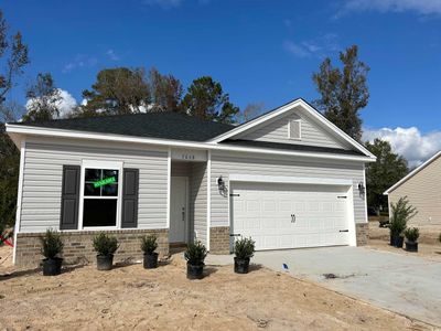 Ranch-style house with a garage | Image 2