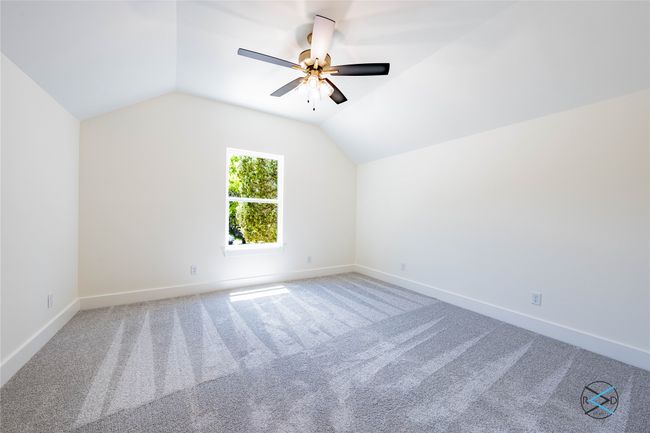 Bonus room featuring ceiling fan, lofted ceiling, and carpet floors | Image 18