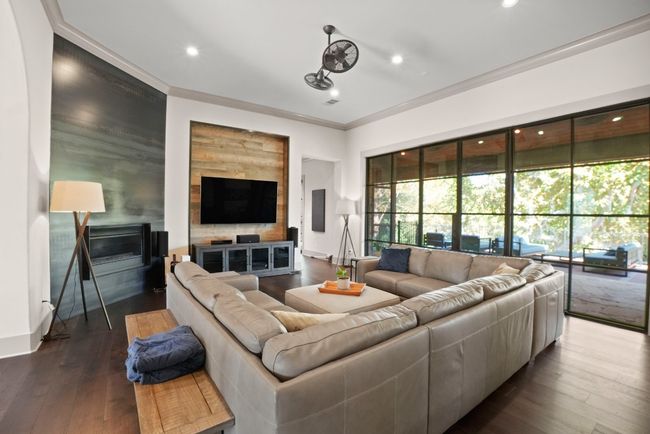 Wall of windows to back deck. | Image 4