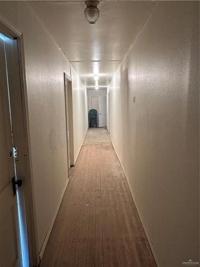 Corridor with wood-type flooring | Image 18