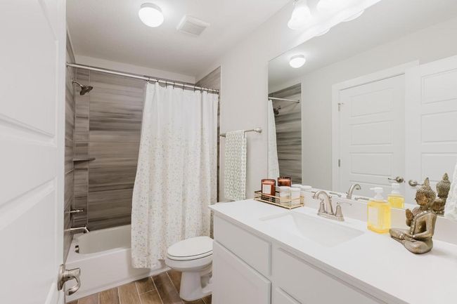 Fourth bathroom and Ensuite to 5th bedroom on second level | Image 33