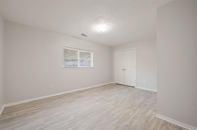 Another view of the middle bedroom | Image 16