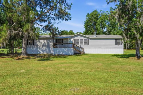 3213 Cypress Trails Dr, POLK CITY, FL, 33868-9487 | Card Image