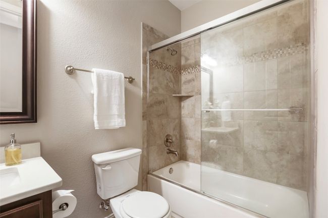 Secondary bath with custom glass shower doors | Image 17