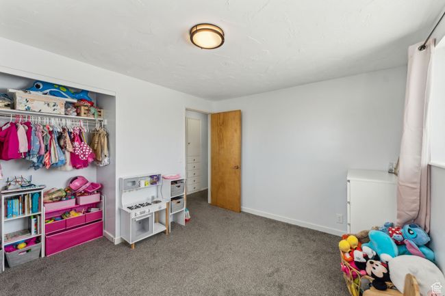Playroom featuring baseboards and carpet | Image 11