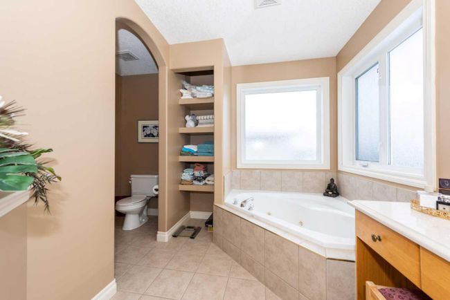 1212 Woodside Way Nw, Home with 4 bedrooms, 2 bathrooms and 4 parking in Airdrie AB | Image 32