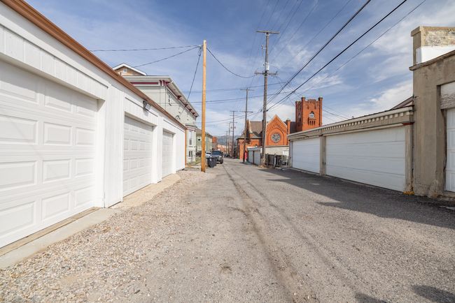 View of street with community garages | Image 34