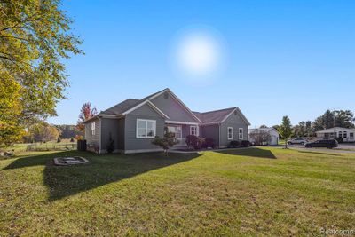 7898 Hough Road, Home with 4 bedrooms, 2 bathrooms and null parking in Almont Twp MI | Image 3