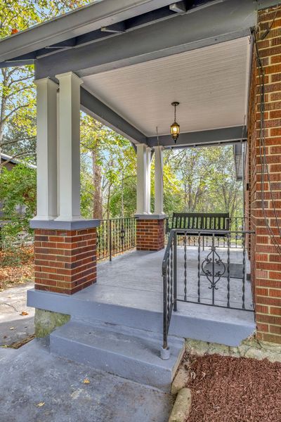 Relax on the porch swing and take in the outdoors | Image 3