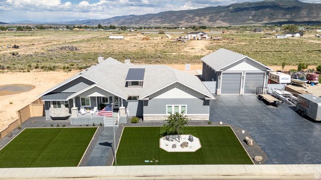 View of front of house featuring a mountain view and a front yard | Image 113