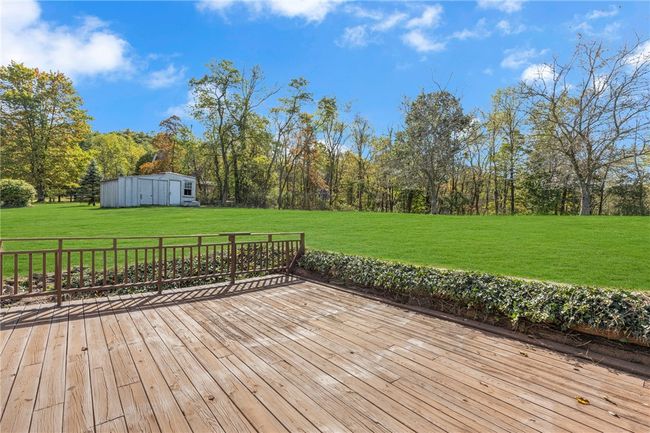 Rear deck overlooking the expansive backyard. | Image 25