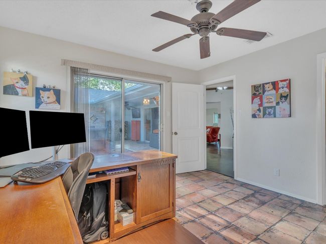 Office with a ceiling fan and baseboards | Image 20