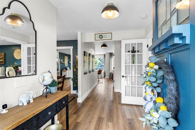 Foyer entrance with wood finished floors and baseboards | Image 8