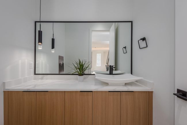 Bathroom featuring a sink and double vanity | Image 17