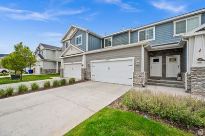 7425 N Hutch Ln, Townhouse with 3 bedrooms, 2 bathrooms and 4 parking in Eagle Mountain UT | Image 3