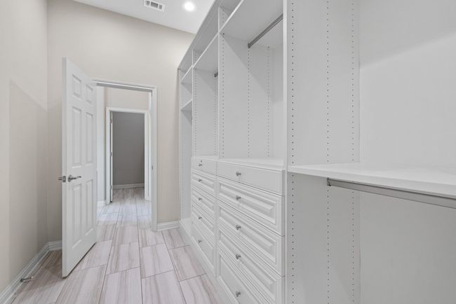 View of walk in closet | Image 18