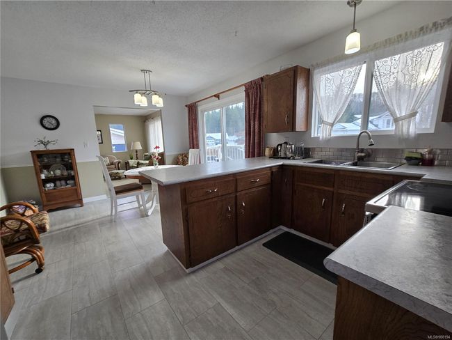 7071 Mc Dougal Pl, House other with 4 bedrooms, 3 bathrooms and 2 parking in Port Hardy BC | Image 8