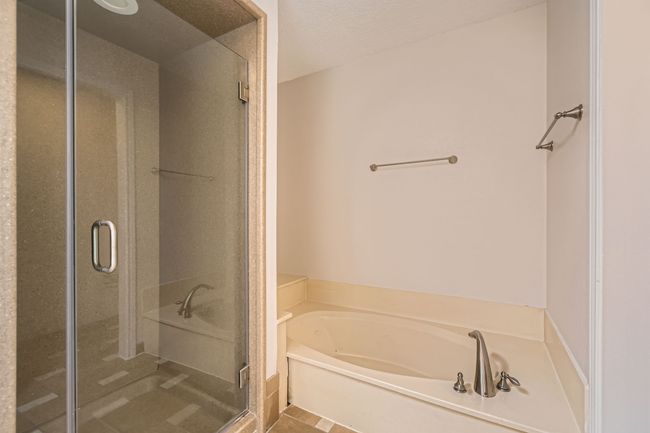Primary Bath with a garden tub and a shower stall | Image 15