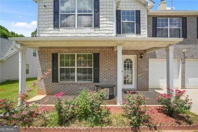 5675 Star Flower Drive, House other with 5 bedrooms, 3 bathrooms and null parking in Ellenwood GA | Image 3