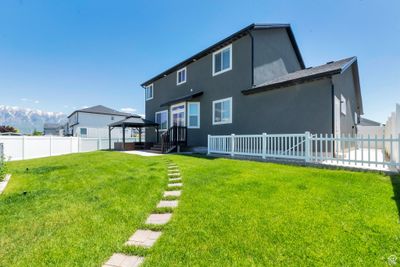 Back of house featuring a yard and a gazebo | Image 3