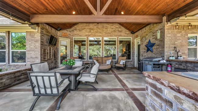 View of patio / terrace with an outdoor hangout area and area for grilling | Image 39