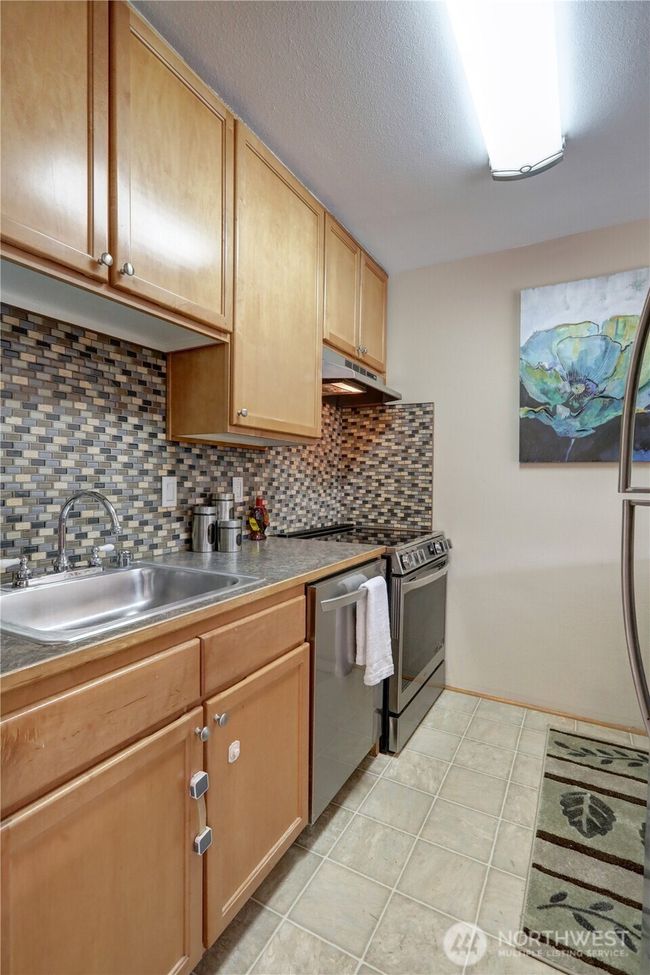 All stainless steel appliances-fridge to the right | Image 5
