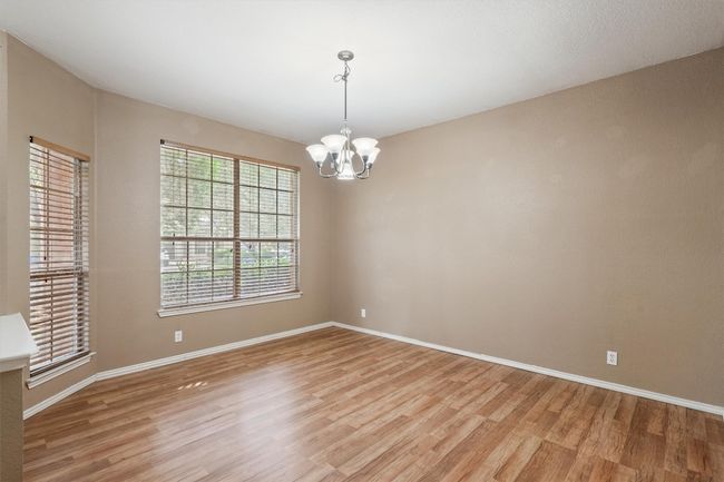 Dining area with chandelier | Image 4