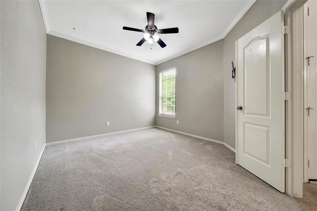 Easily work from home in the large study with French Doors and a window overlooking the front walk. | Image 6