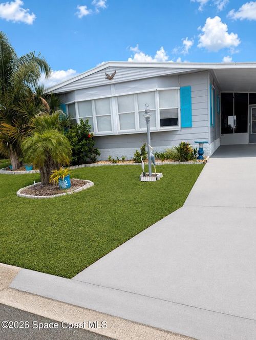 520 Seagull Dr, Barefoot Bay, FL, 32976-7809 | Card Image