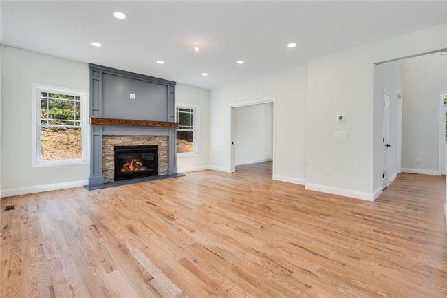 Unfurnished room featuring crown molding and light wood-type flooring | Image 15